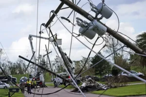 Homeowner Checking For Downed Power Lines And Hazards After A Storm