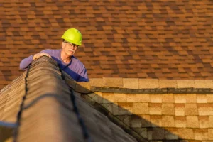 Professional Roof Inspector Checking For Storm Damage